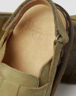 Jorge II mules i tumlat nubuckläder och bakre rem in Muted Olive